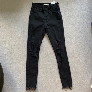 Levis High-rise black ripped jeans